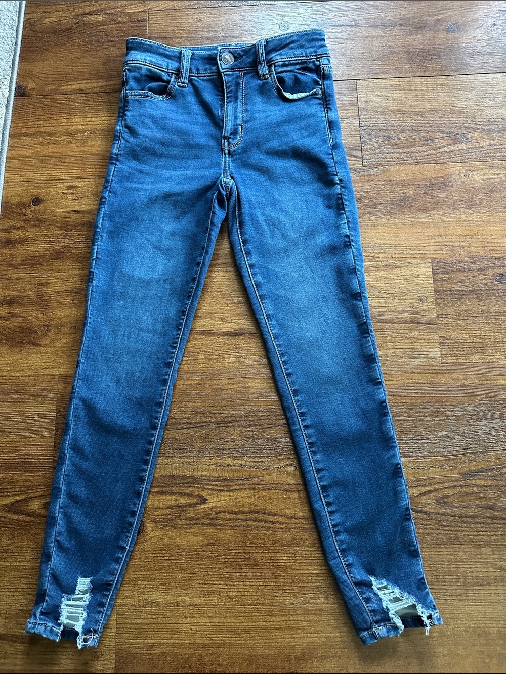 American Eagle Outfitters Dark Blue Skinny Jeans with Distressed Hem